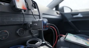 Versatile fast charging car adapter with multiple connection ports ready for various mobile devices and cables.
