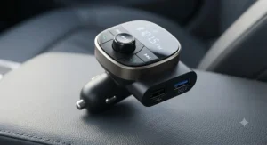 Close-up of a bluetooth fm transmitter for car featuring dual USB charging ports and LED display.
