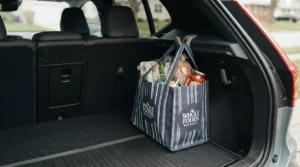 Car shopping hooks for boot keeping supermarket shopping bags upright and preventing bag tipping