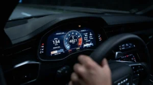 Close-up of a fuel economy monitor for car showing real-time mpg and fuel consumption metrics