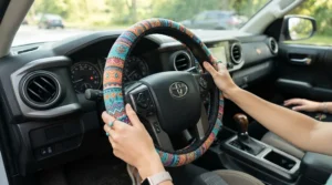 Decorative steering wheel cover for car customising a hatchback interior with personal style